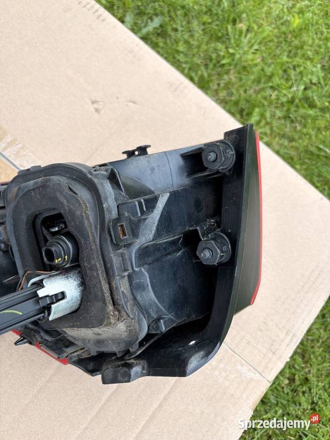 Oryginalne tylne lampy VW Golf 7 HELLA komplet osobowe Mińsk Mazowiecki