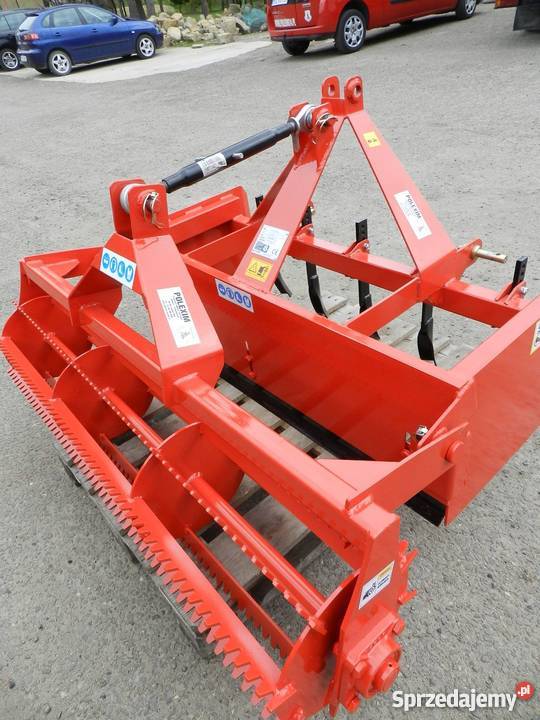 Niwelator równiarka skrzyniowa z wałem strunowym