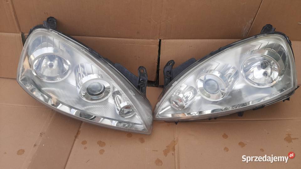 lampa lewa 13237263 prawa 13237262 Opel Corsa C Dębno