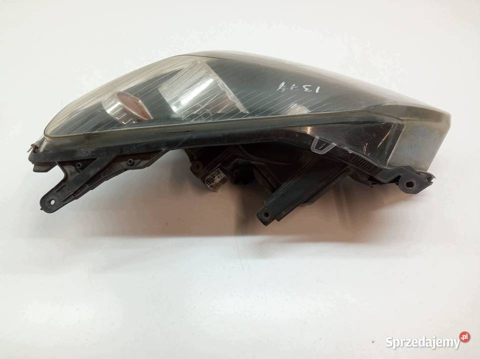 LAMPA PRZÓD LEWA EU 24451032 Opel Astra III osobowe Lampy przednie świętokrzyskie