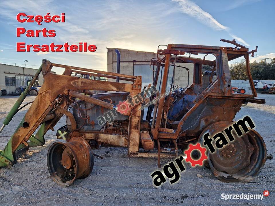 John Deere 3310 części silnik skrzynia biegów Byków