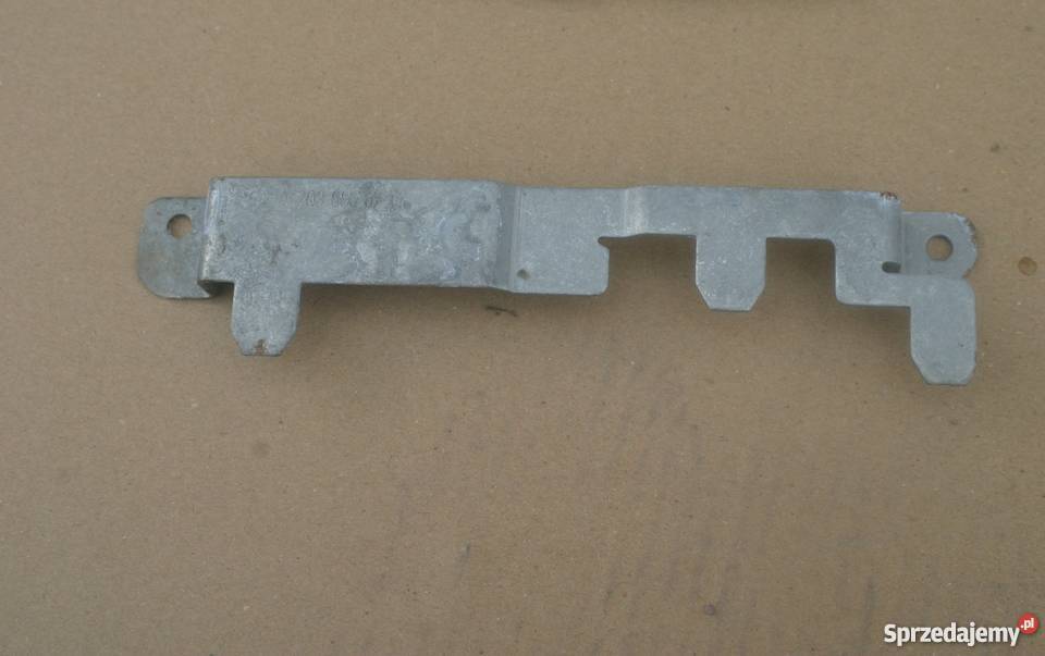 MERCEDES W203 UCHWYT MOCOWANIE TAPICERKI Bieleń