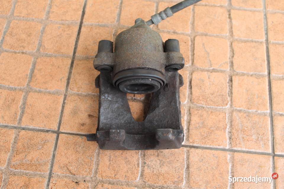 ZACISK HAMULCOWY PRAWY PRZÓD VW BEETLE 20B wielkopolskie