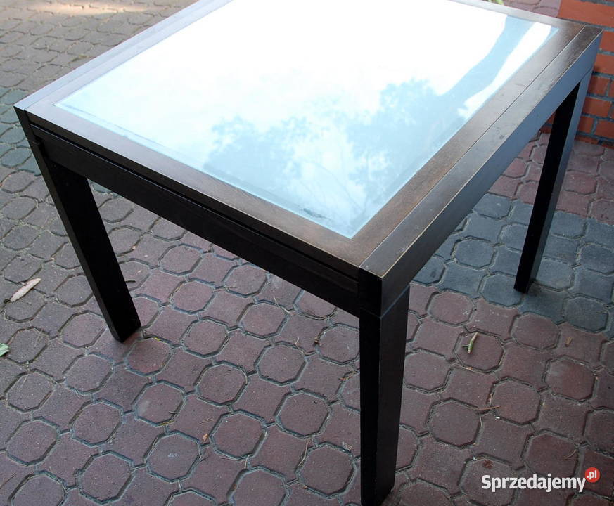 Prostokątny rozkładany szklany drewniany stół