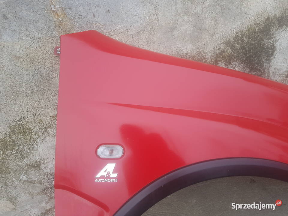 Suzuki Ignis MH 0410 błotnik przód przedni