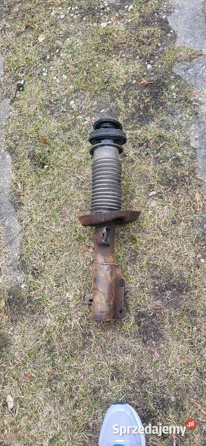 Amoryzator Astra J przód prawa strona 2011r Gdynia