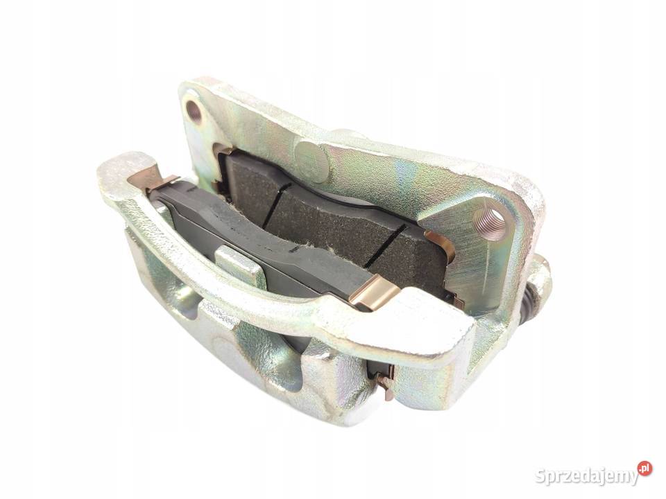 ZACISK HAMULCOWY LEWY PRZÓD KIA CARNIVAL UP GQ osobowe
