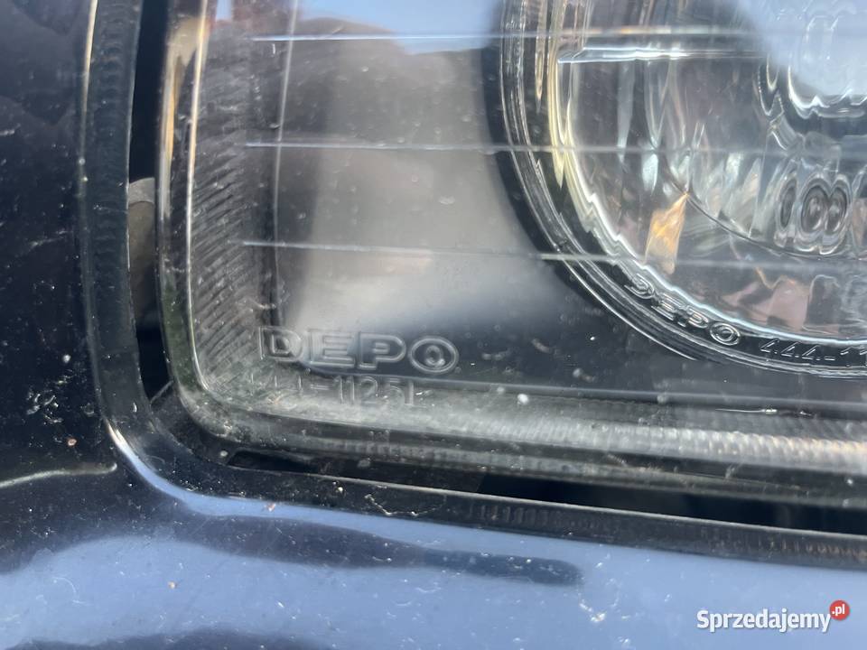 Lampa lewy przód z kierunkowskazem BMW e36 osobowe Lampy przednie