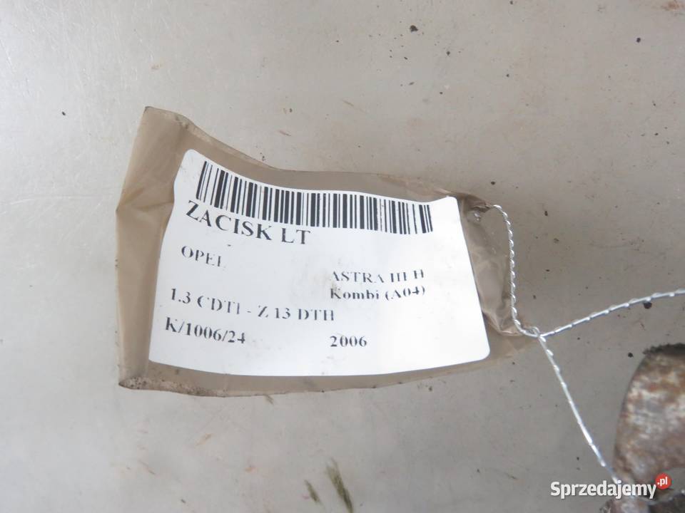 ZACISK LEWY TYŁ OPEL ASTRA III H 13 CDTI