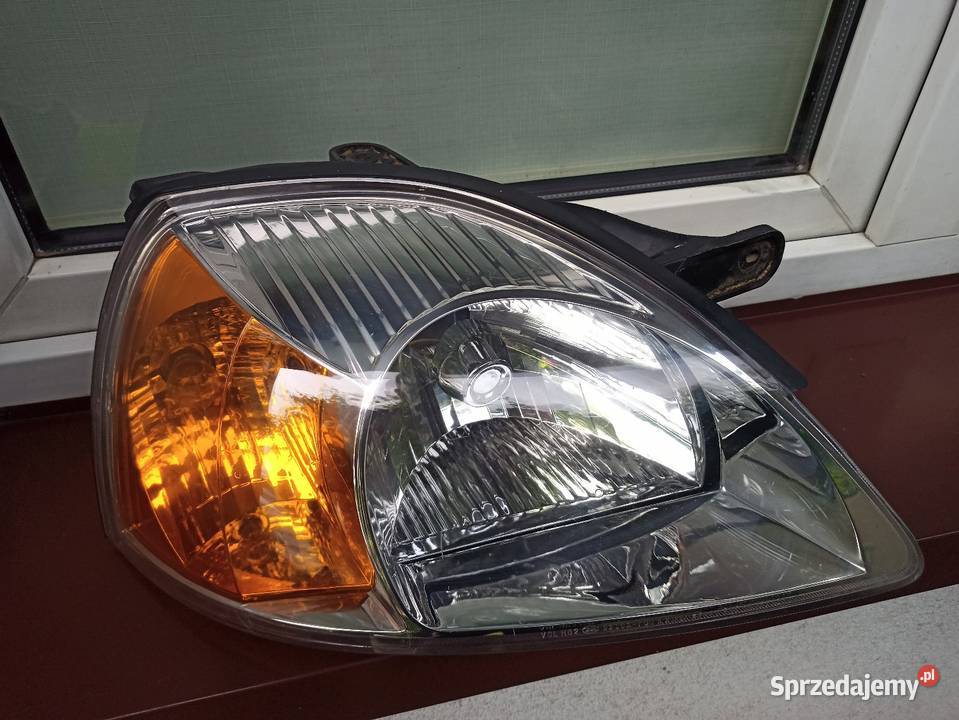 Kia Rio II 2 lampa przednia prawa reflektor Lampy przednie Sieradz