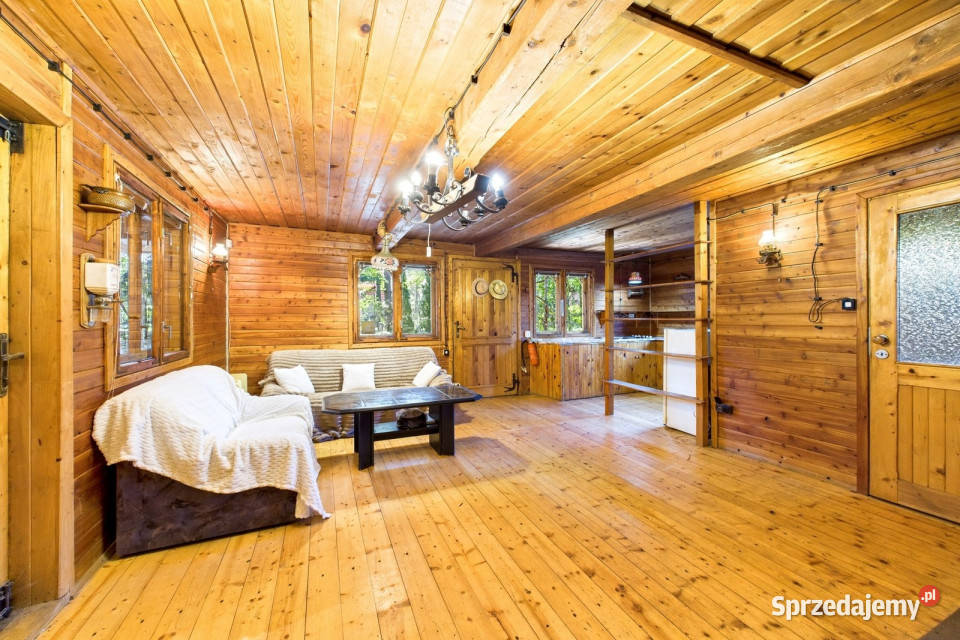 Drewniany dom wśród lasów Osolina balkon