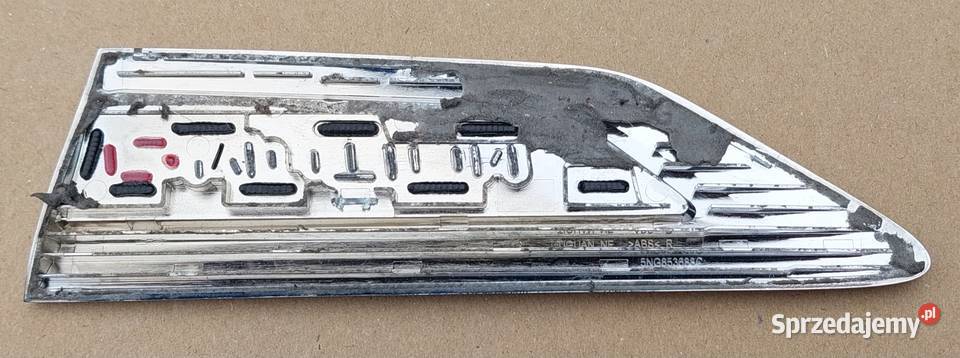 EMBLEMAT BŁOTNIKA PRAWY 4 MOTION VW TIGUAN II 5N osobowe Mielęcin