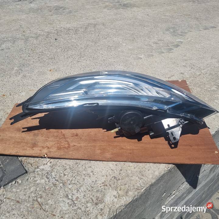 Lampa przednia lewa oryginalna OE Renault Clio Rawa Mazowiecka