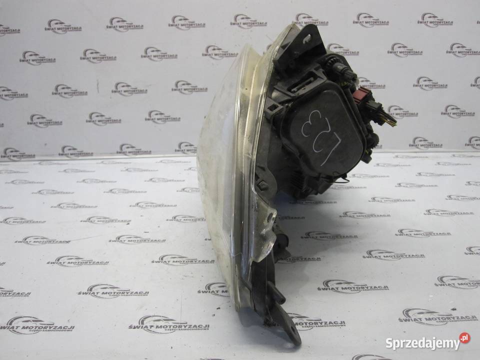 OPEL CORSA D lampa prawa przód 89391390 13186384
