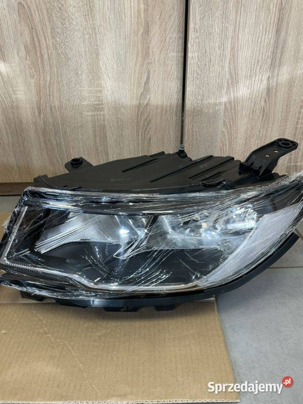 Jeep Compas 20 reflektor przód nowy osobowe Motycz