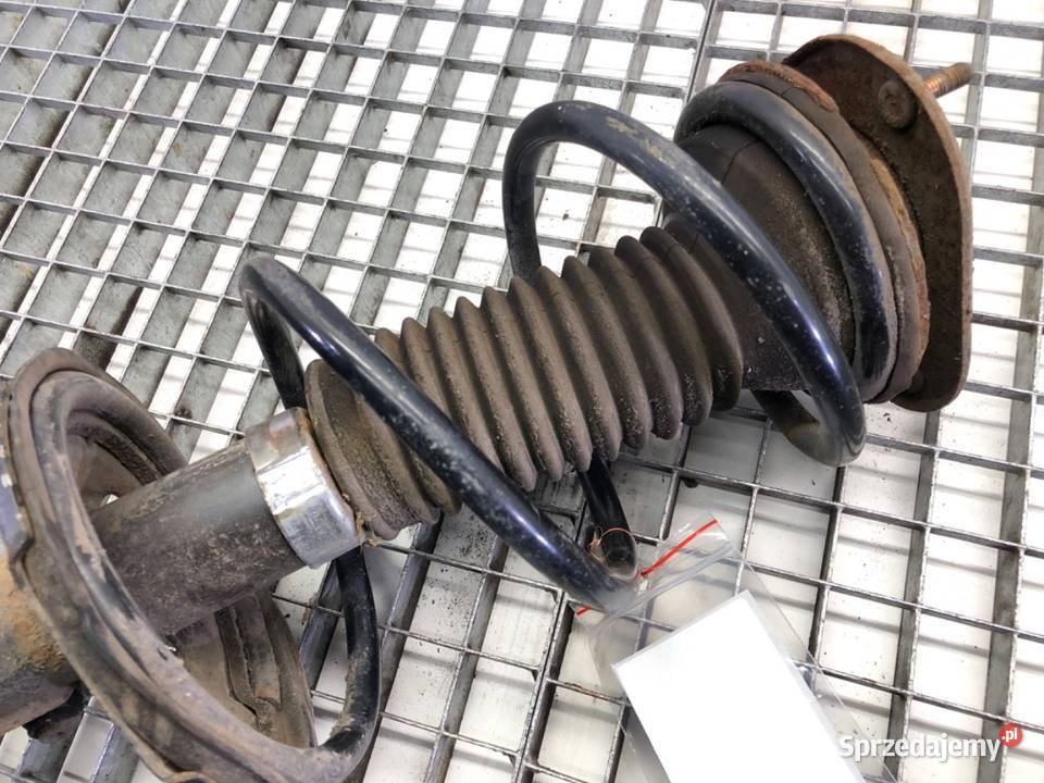 AMORTYZATOR LEWY PRZÓD ZE SPRĘŻYNĄ TOYOTA