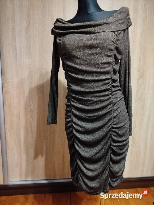 Dzianinowa sukienka połyskująca złotym rozmiar Biecz