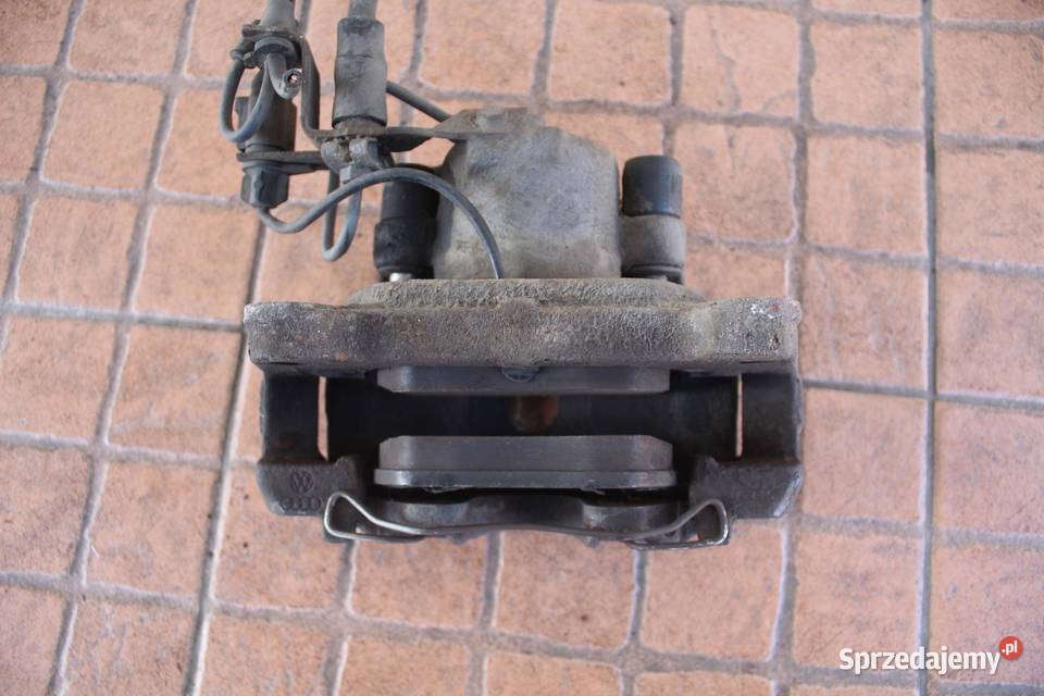 ZACISK HAMULCOWY PRAWY PRZÓD AUDI A6 C5 19 TDI