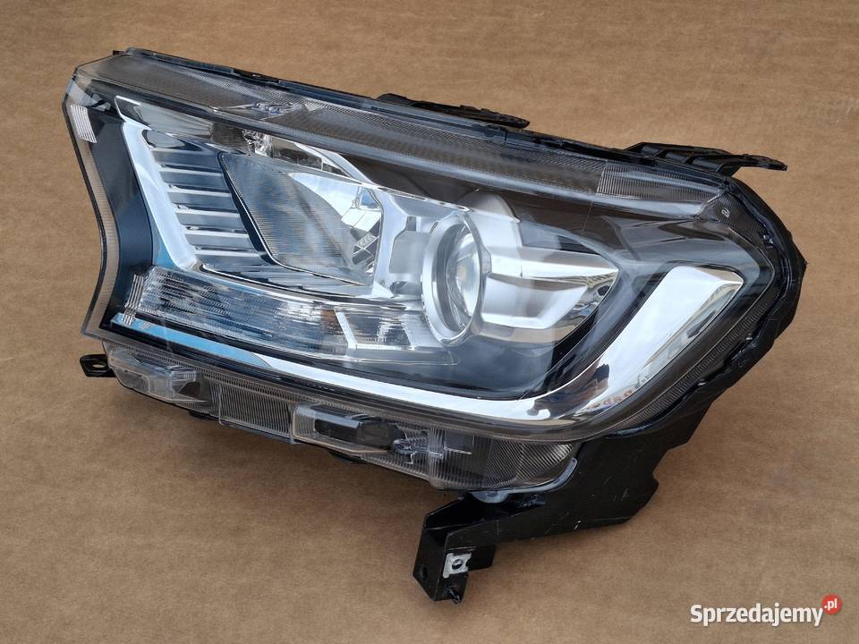 FORD RANGER III LIFT 15 REFLEKTOR LEWY HIR2 H15 Bieleń