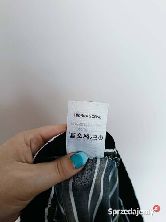Choise Czarne spodnie w białe i oliwkowe paski r pomorskie