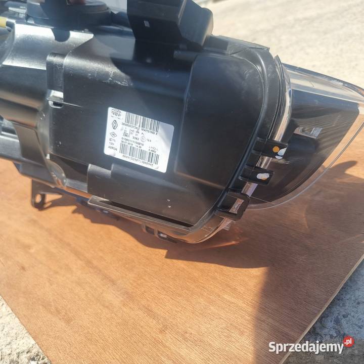 Lampa przednia lewa oryginalna OE Renault Clio