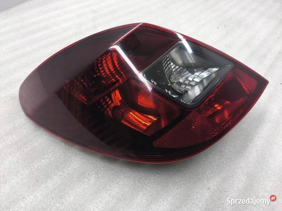 LAMPA LEWY TYŁ OPEL CORSA D 13296479 osobowe Lampy cofania
