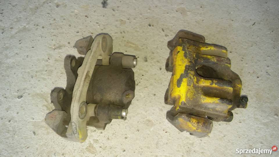 docisk zacisk hamulcowy bmw e36 Muchy