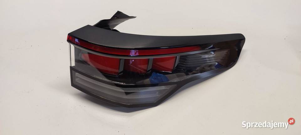 VW TAYRON LAMPA LEWY TYŁ 57L945208A Lampy cofania