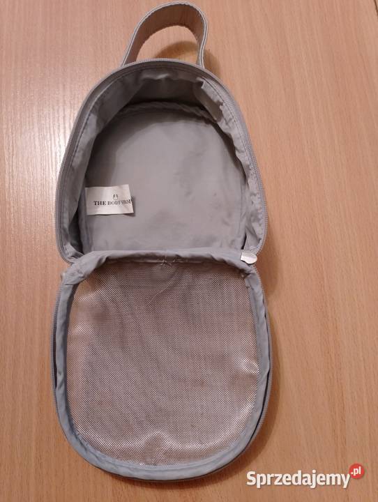 KOSMETYCZKA BODY SHOP satynowa srebrna z rączką Złotniki sprzedam