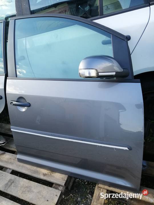 Volkswagen Touran Lift 20062010r drzwi kompletne Motoryzacja