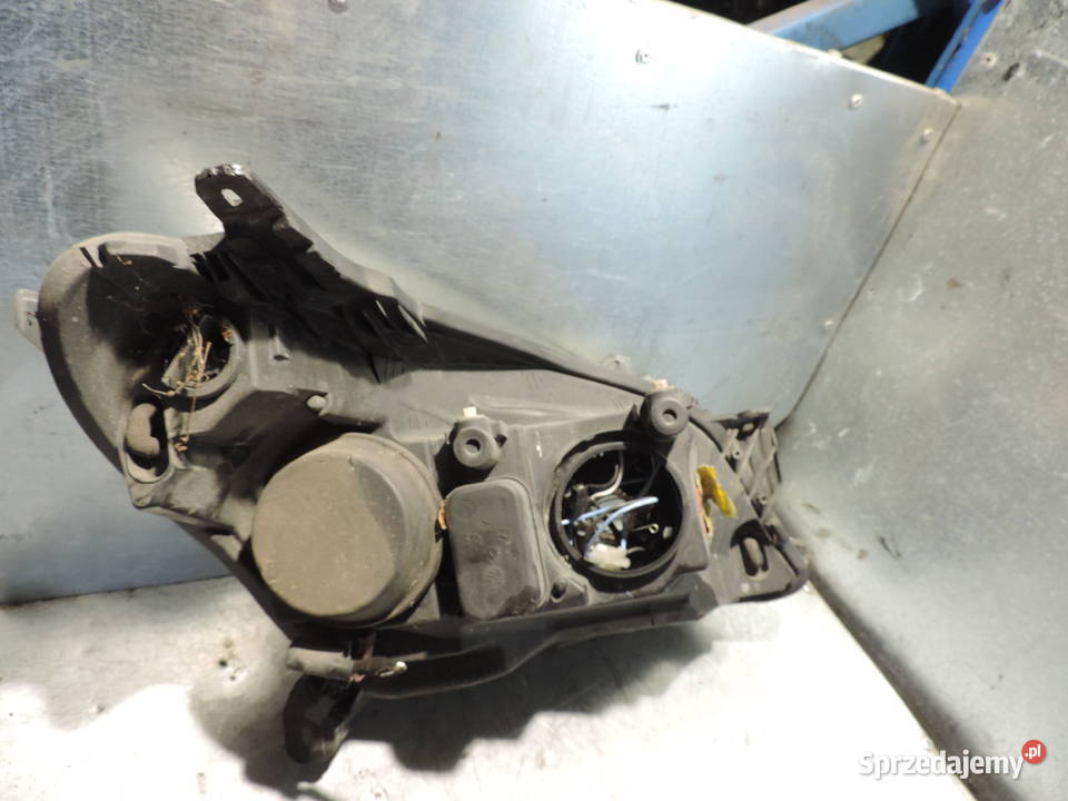 OPEL ASTRA H III FL LAMPA LEWY PRZÓD