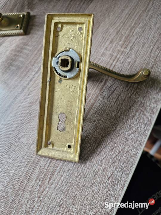 Klamki mosiężne z szyldami Klamki i uchwyty Ożarów