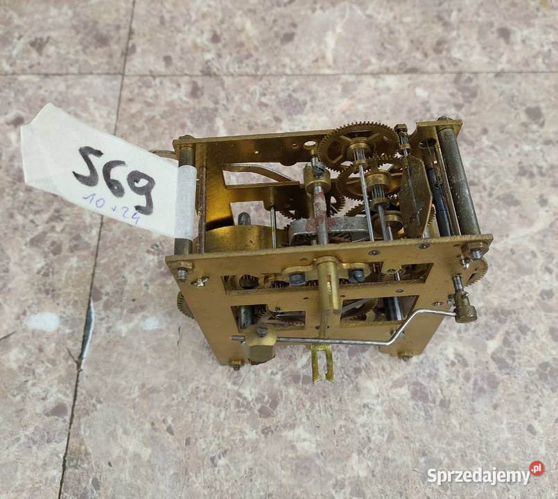 569 Mechanizm starego małego zegara ściennego Antyki Tczew