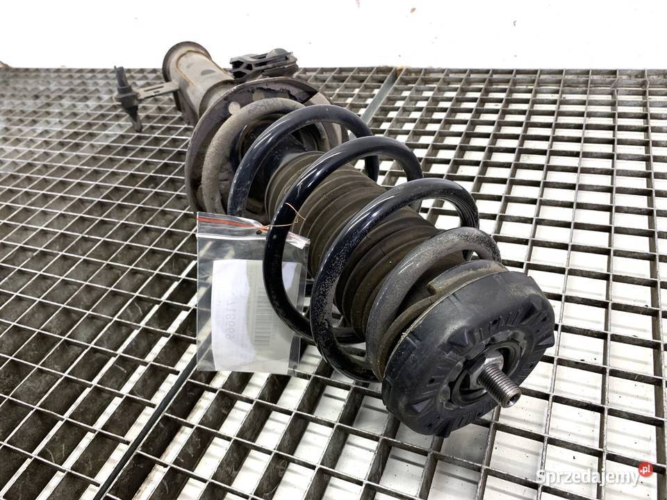 AMORTYZATOR LEWY PRZÓD ZE SPRĘŻYNĄ CHEVROLET