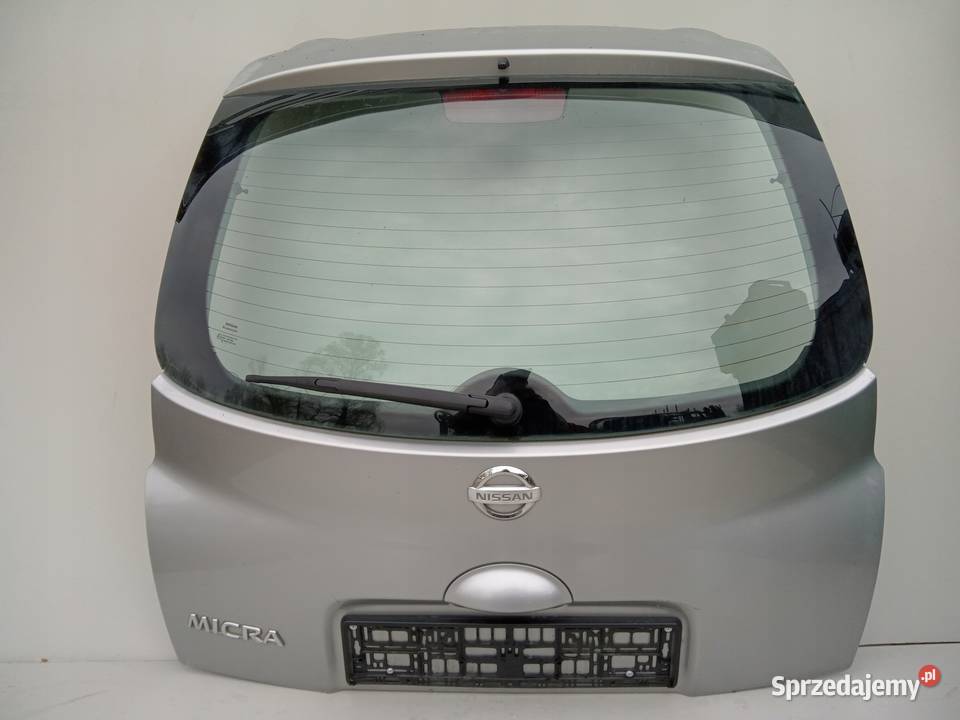 ZNACZEK EMBLEMAT KLAPY BAGAŻNIKA NISSAN MICRA Pozostałe wielkopolskie Nowy Tomyśl