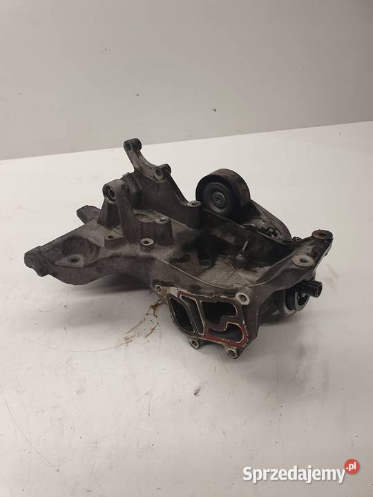 ŁAPA ALTERNATORA AUDI VW 18 20 TFSI 06H903143E osobowe Silniki i osprzęt Przystajń