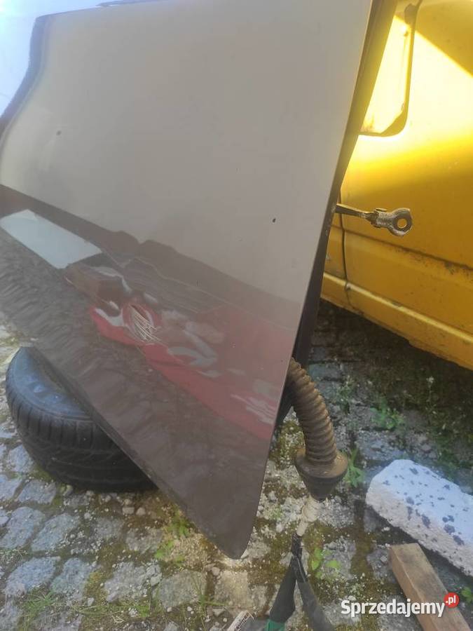 Auris II drzwi przód lewe boczek szyba mechanizm części blacharskie Ostrowiec Świętokrzyski