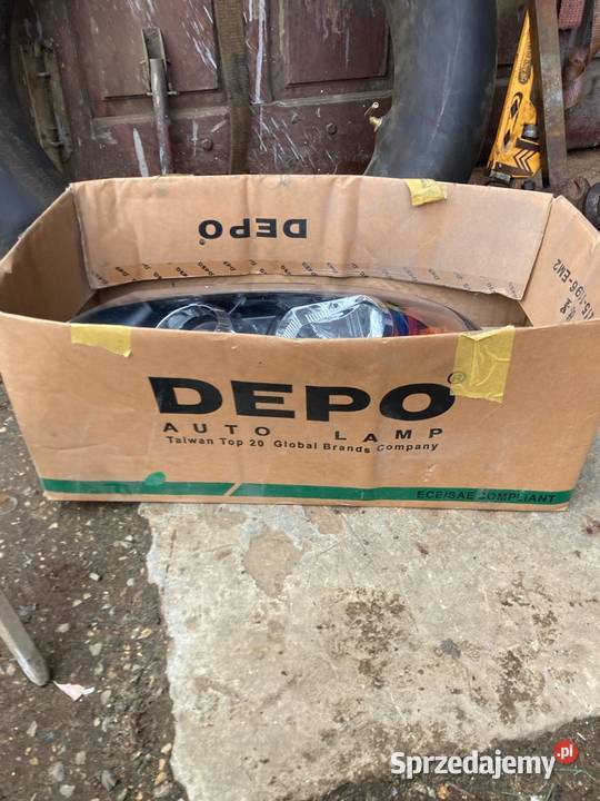 Reflektor lewy Nissan Almeria depo 2151196l