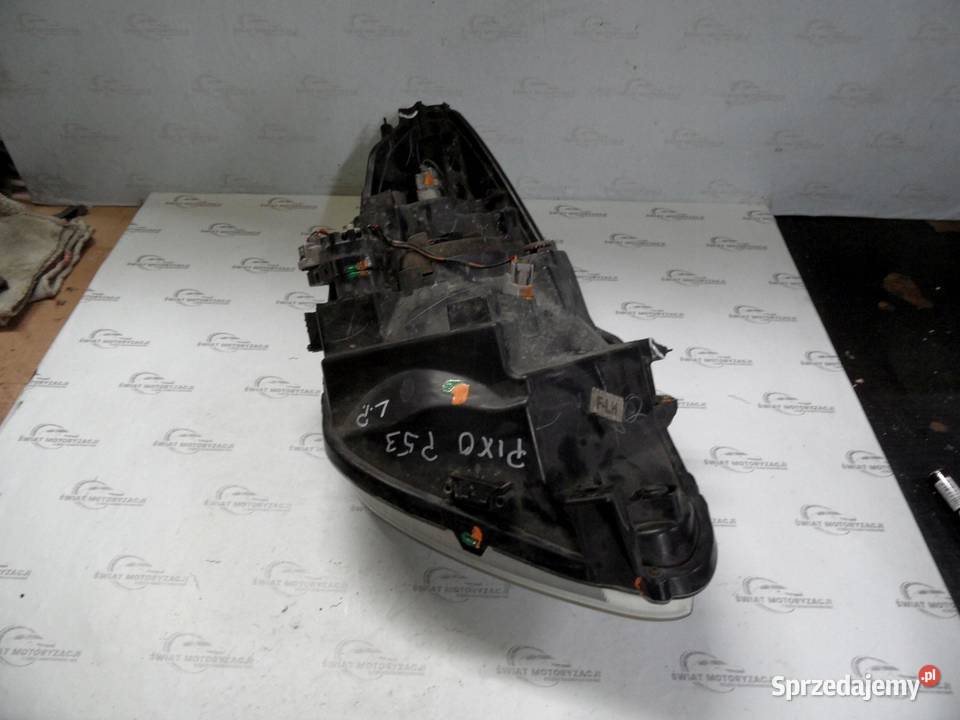 NISSAN PIXO 10r lampa lewa przód ANGLIK osobowe