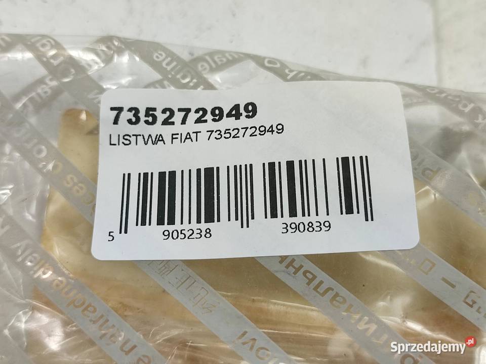 LISTWA BŁOTNIKA LEWY TYŁ FIAT PUNTO 14 2009 Listwy i nakładki