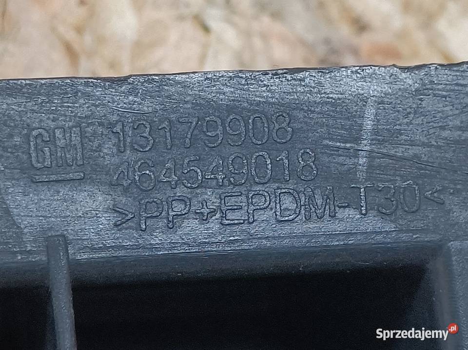 OPEL CORSA D 0614 E 1419 ŚLIZG MOCOWANIE ZDERZAK Pleszew