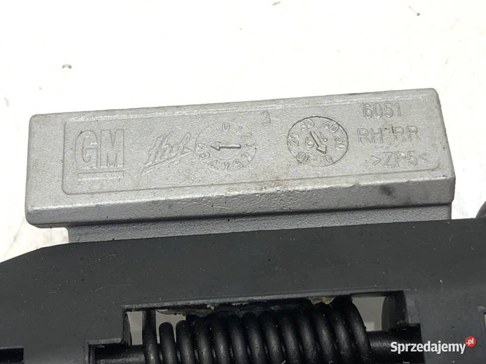 KLAMKA ZEWNĘTRZNA LEWY TYŁ OPEL CORSA E