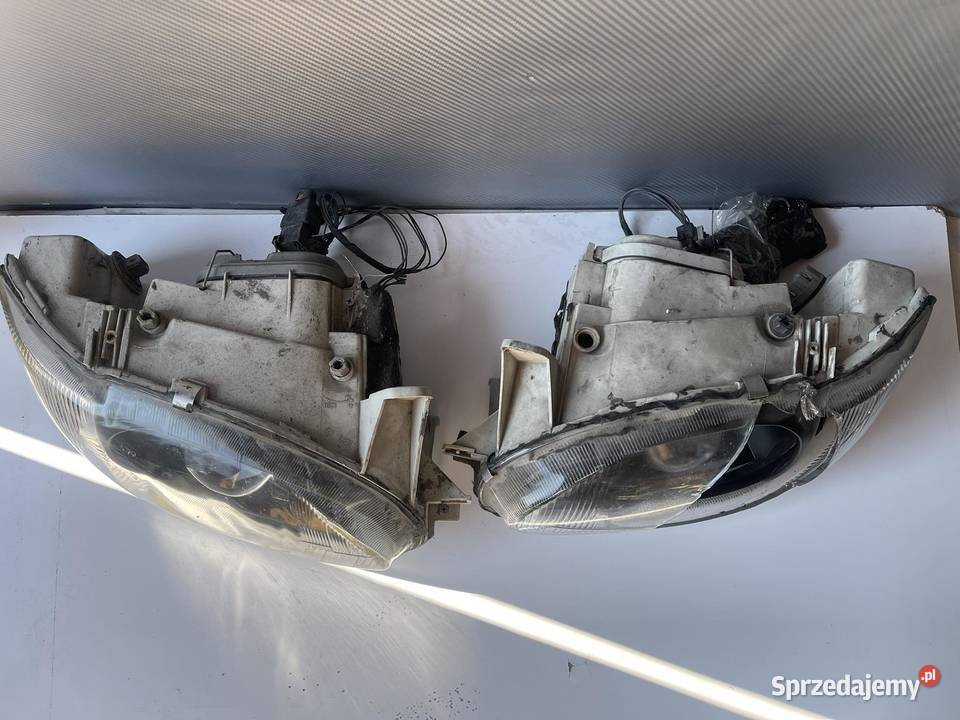 FORD ESCORT LAMPY SOCZEWKI BILED osobowe Ostroróg sprzedam