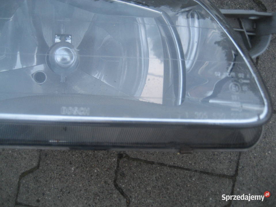 mazda 323 f 9800r lampa przód prawa bosch Rakoniewice