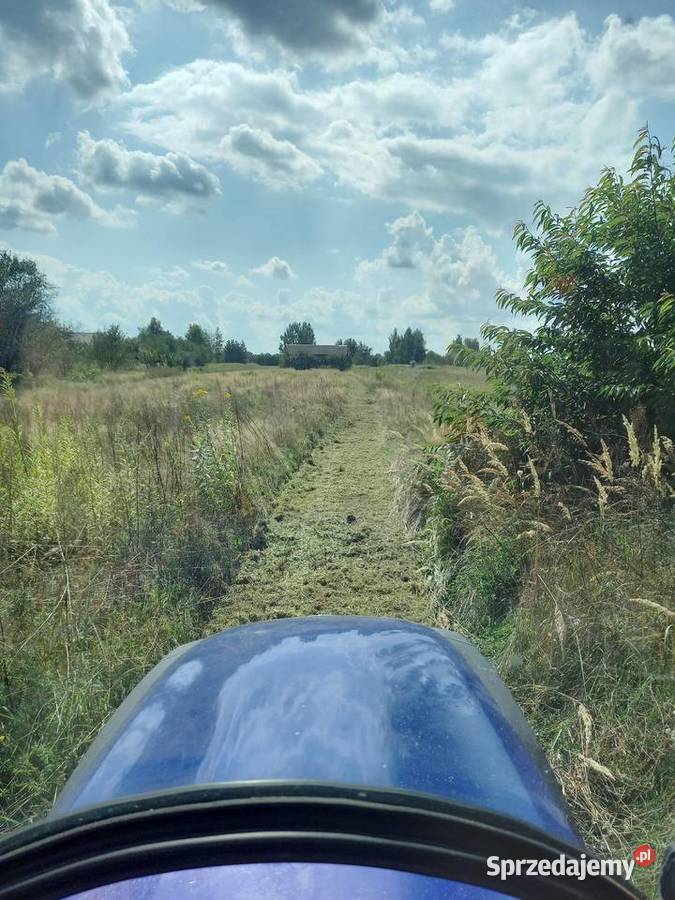 Koszenie trawy nieużytków ugorów zarośli mazowieckie Trojanów