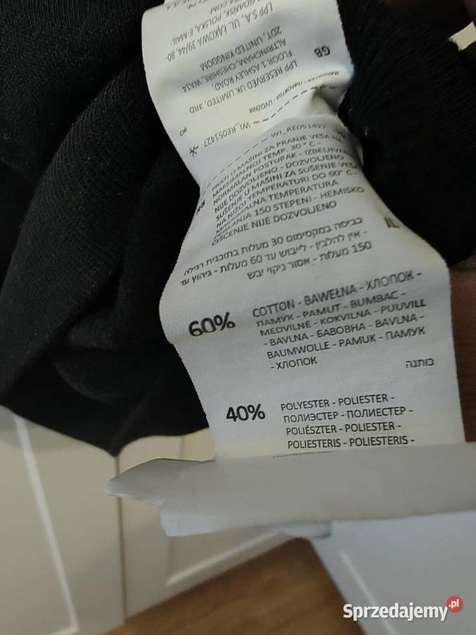Czarna sukienkatunika z kieszeniami zdobieniem Wieruszów