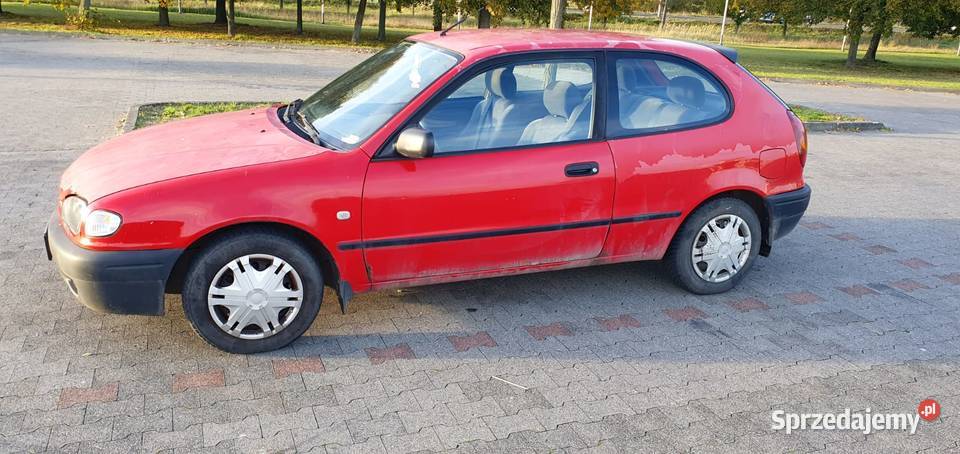 Toyota Corolla 14 VVTI 1999 Salon czerwony Poznań