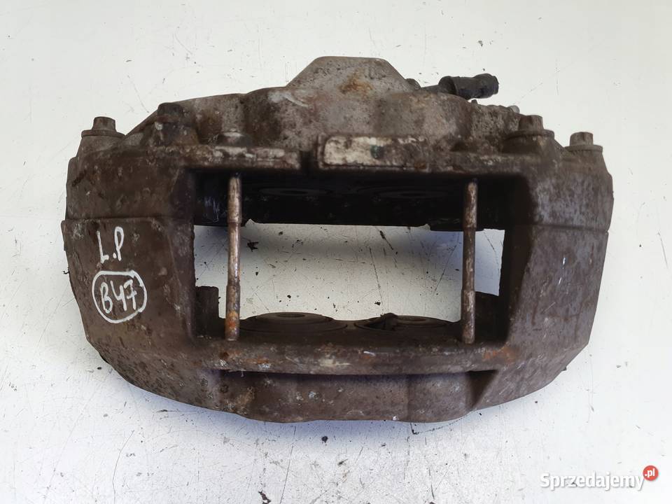 Audi A6 C7 PRZEDNI ZACISK HAMULCOWY lewy przód Rudka