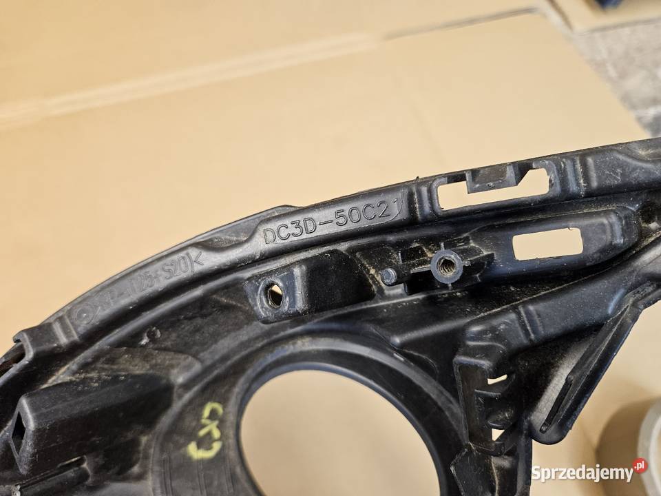MAZDA CX3 CX3 KRATKA RAMKA HALOGENU LEWA PRZÓD Międzychód