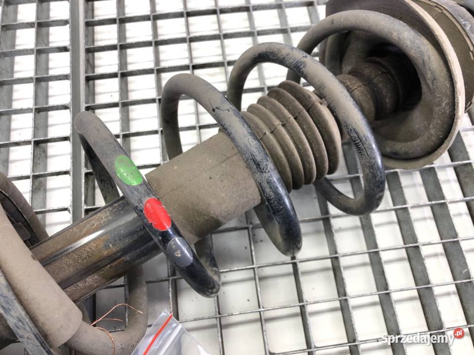AMORTYZATOR PRAWY PRZÓD ZE SPRĘŻYNĄ DACIA DUSTER osobowe podkarpackie